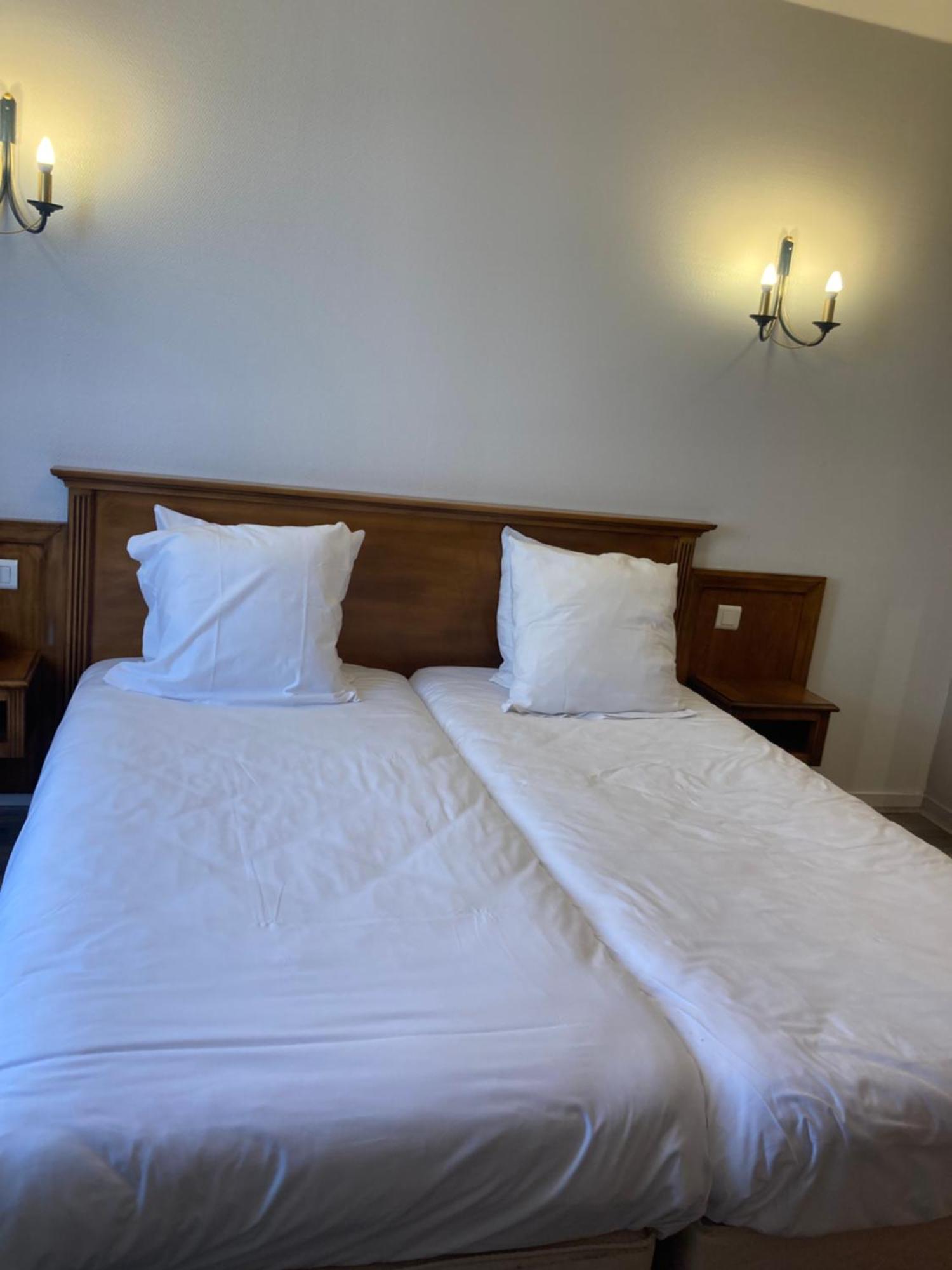 Logis Hotel & Restaurant Du Sauvage La Ferté-Gaucher Екстериор снимка